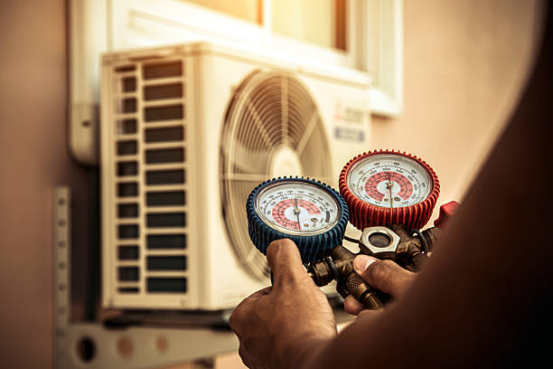 Professional Hvac technician working in Boxborough, MA
